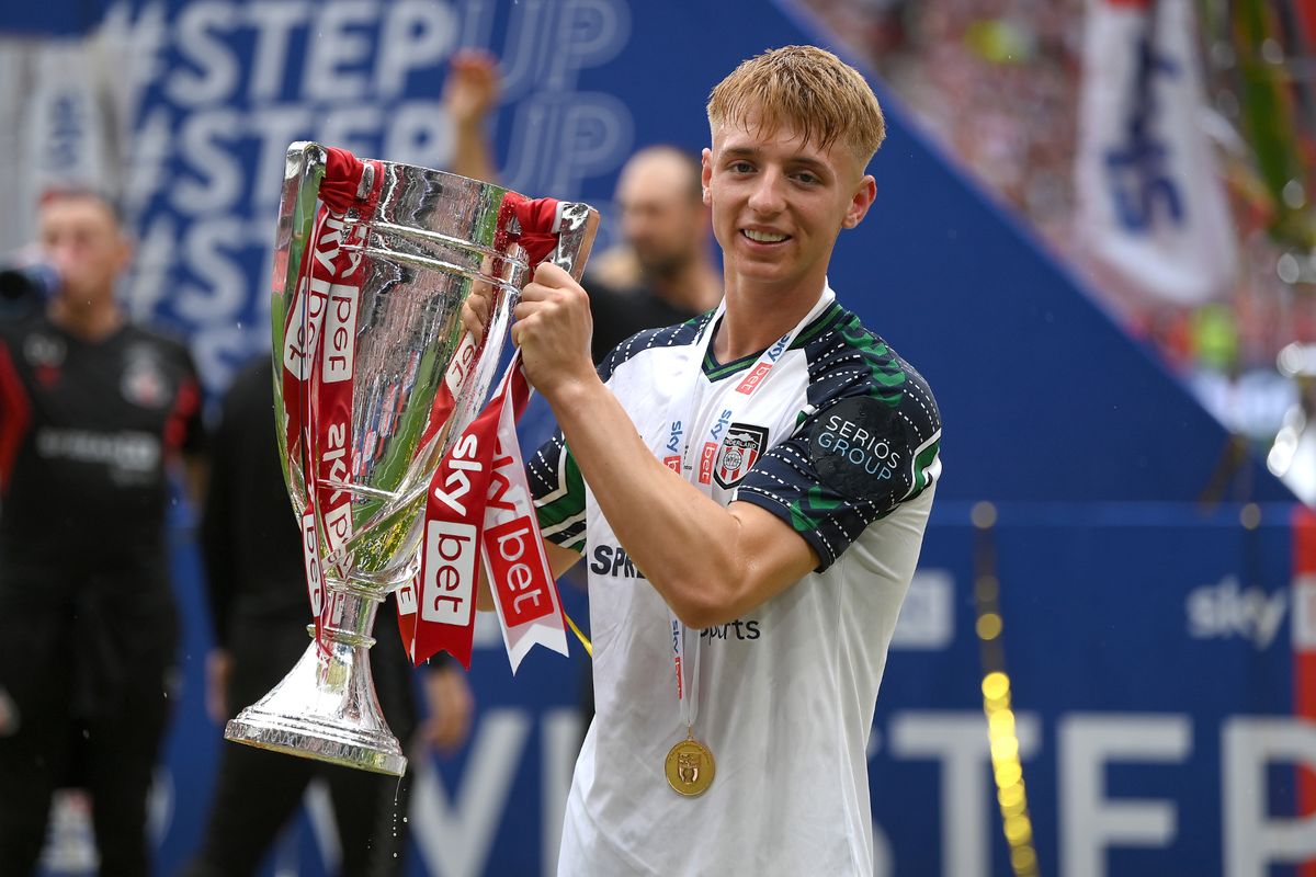 Tom Watson of Sunderland with The Sky Bet Championship Play-Off trophy