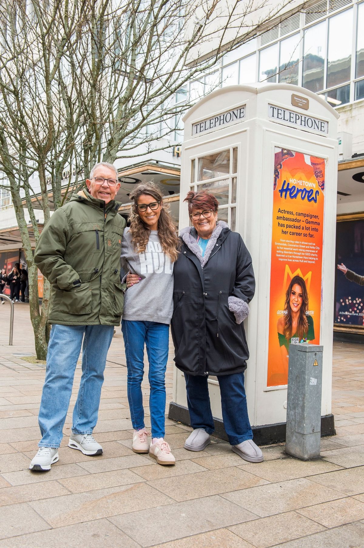 Gemma Oaten at the unveiling of the classic K6 phone kiosk dedicated in her honour, with her parents, Marg and Dennis