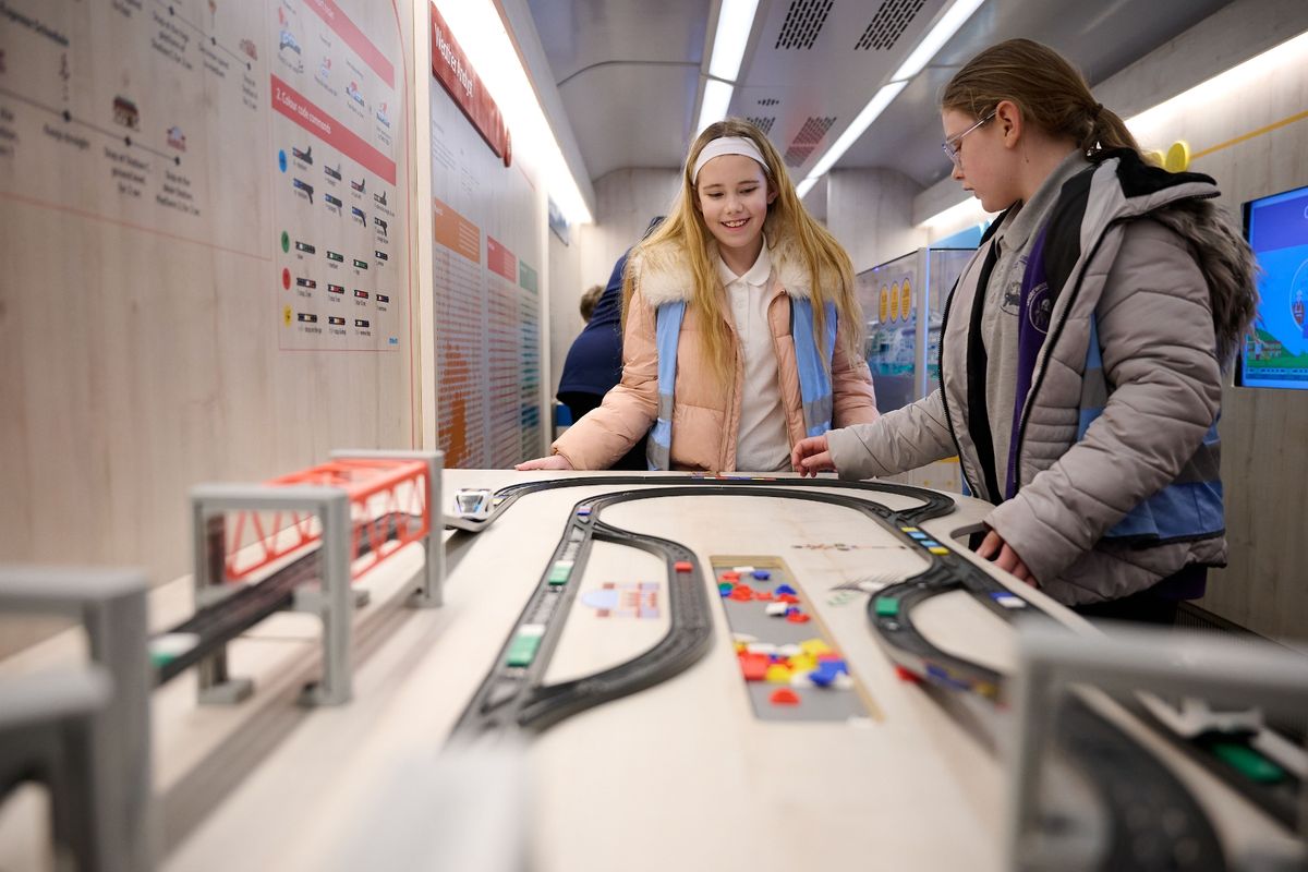 Schoolchildren try the hands-on activities during Inspiration's visit to Crewe