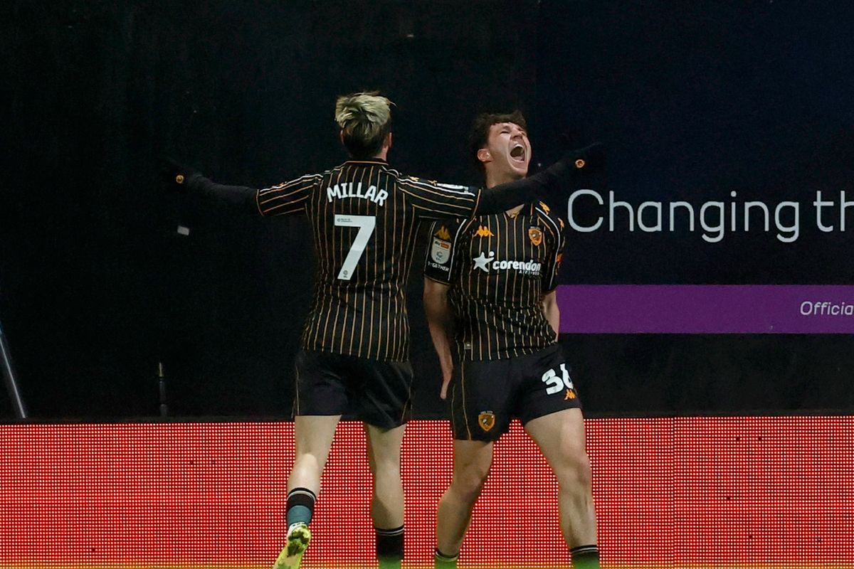 Hull City's Lewis Koumas (right) celebrates after scoring his side's second goal during the Sky Bet Championship match at the SToK Racecourse in Wrexham