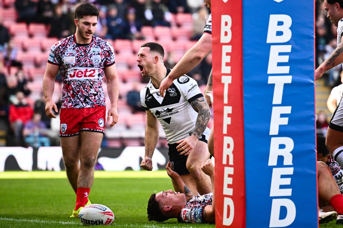 Hull FC's Cade Cust celebrates his try at Leigh.