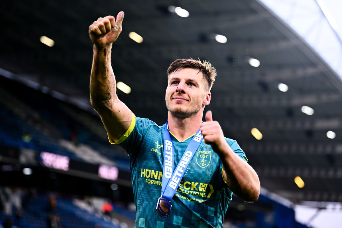 Hull KR's Tom Davies celebrates his side's victory over Huddersfield Giants in Super League round four.