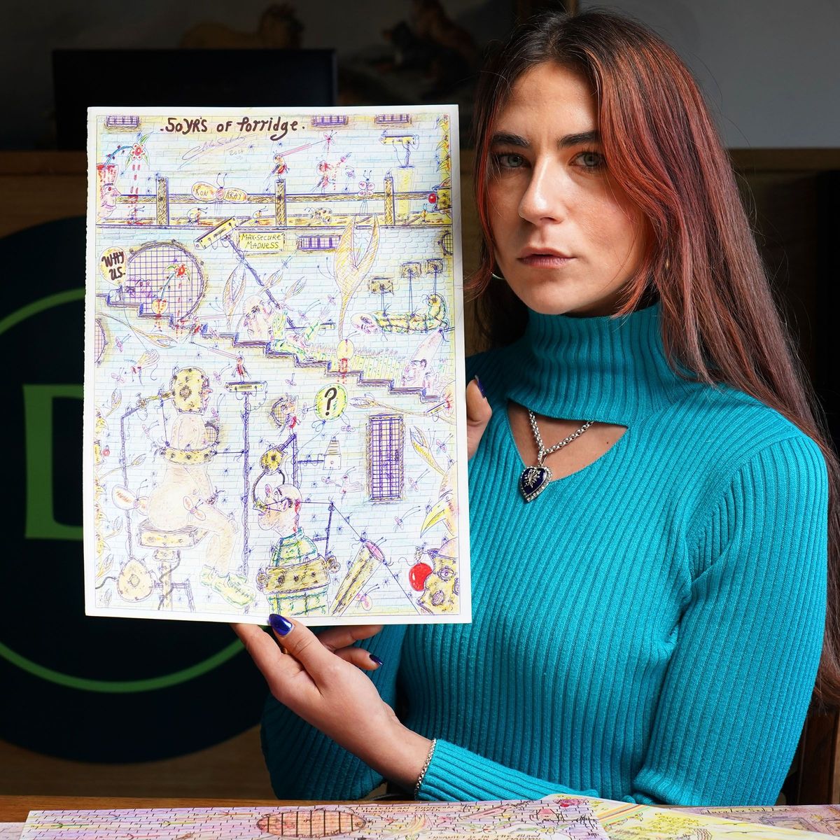 Coralie Thomson of auctioneers Duggleby Stephenson with Bronson's '50 Yrs of Porridge'