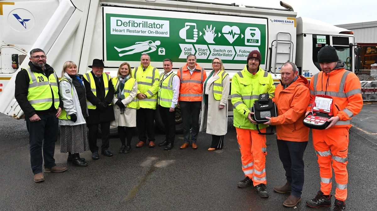 In front of one of the trucks are, from left, Carl Gillyon (ERYC head of highway network management), Julie Turrell (ERYC road safety manager), Colin Walker (ERYC head of transportation services), Angela Dearing (ERYC director of housing, transportation and public protection), Carl Skelton (ERYC director of streetscene services), Karl Jeffs (ERYC interim head of environmental services), Philip Burgess (ERYC fleet services manager), Jo Joveini (lead trainer at Act Fast First Aid), Andrew Fowler (ERYC refuse crew), Cllr Paul West, and Jay Hughes (ERYC refuse crew)