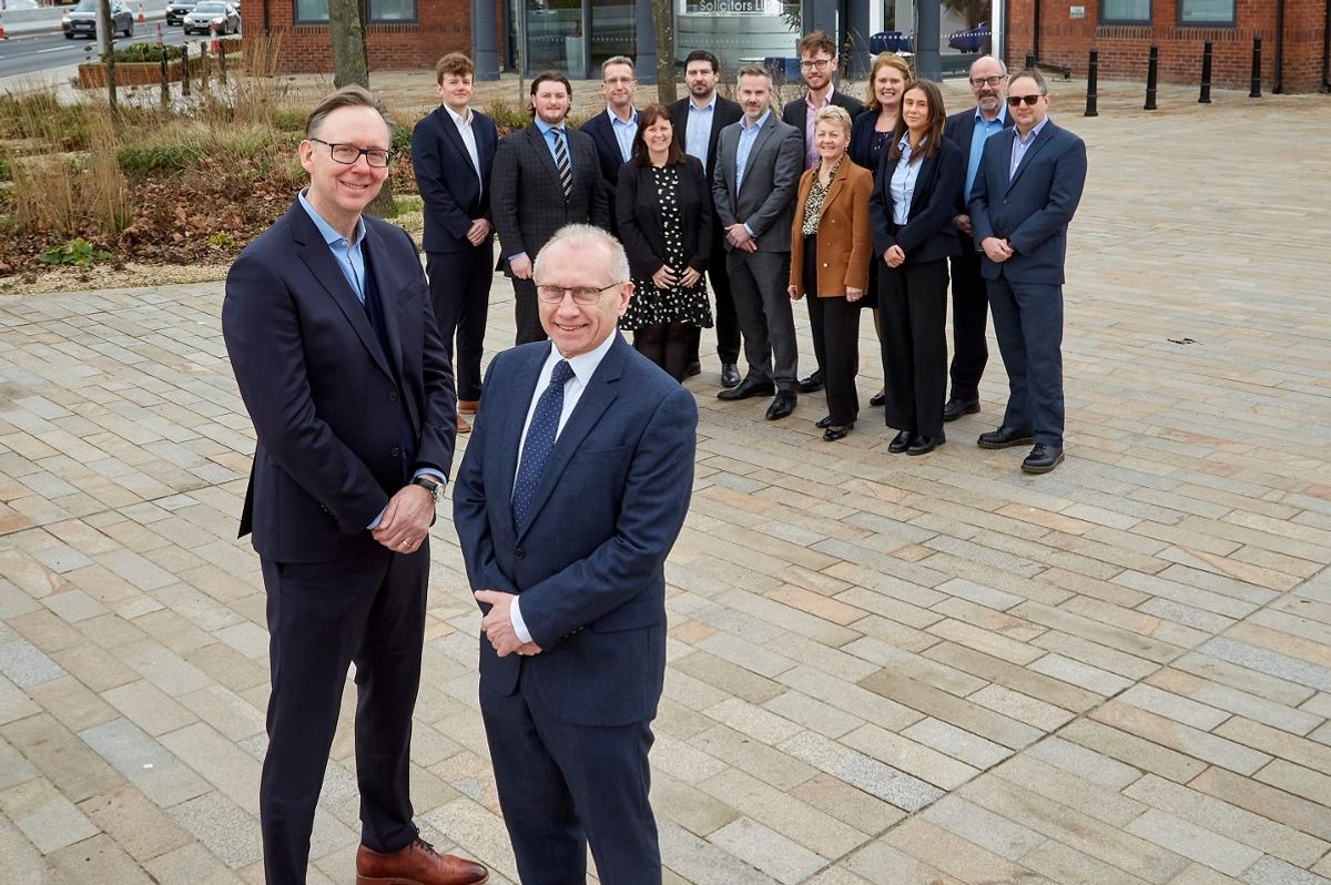 Nick Dean with Hugh Smith, and the litigation & dispute resolution team