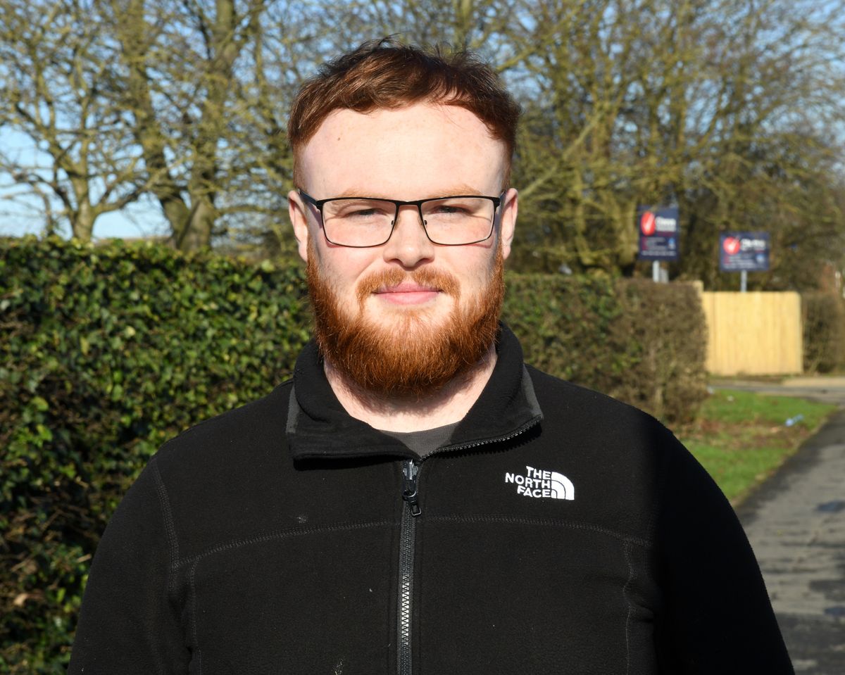 Jason Hill outside Cleeve Primary School