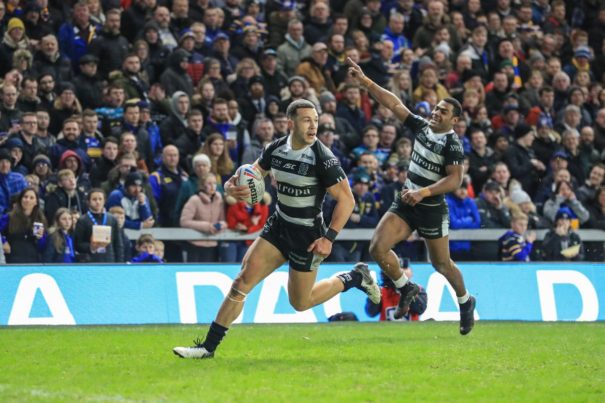 Carlos Tuimavave of Hull FC breaks free and goes over for the first try of the game
