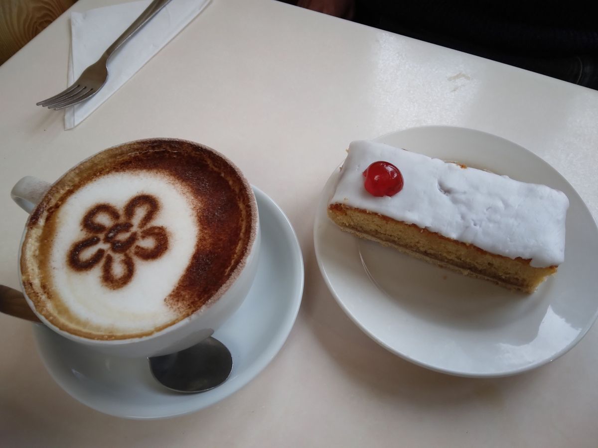 ... and sip a cappuccino with a Bakewell slice