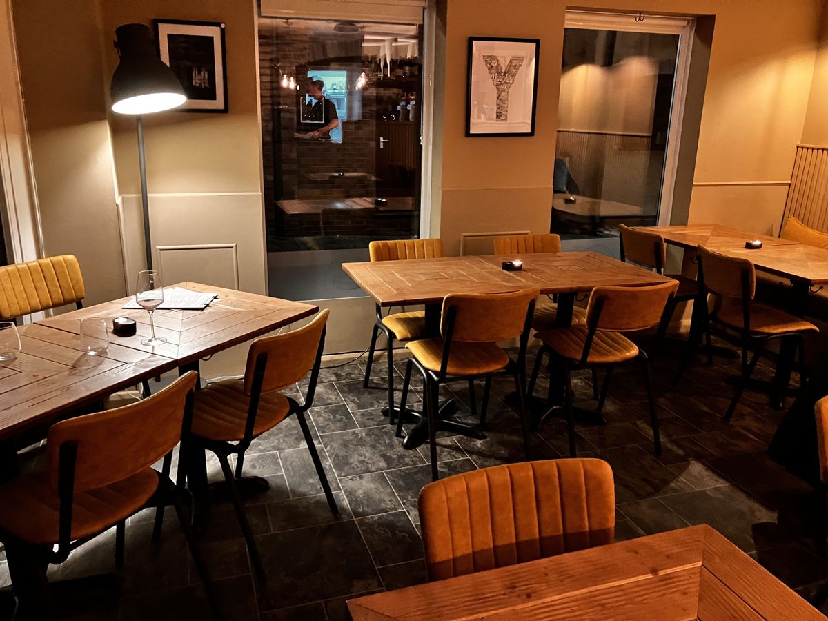 The interior has cosy, ambient lighting and each table has a cheerful tealight candle