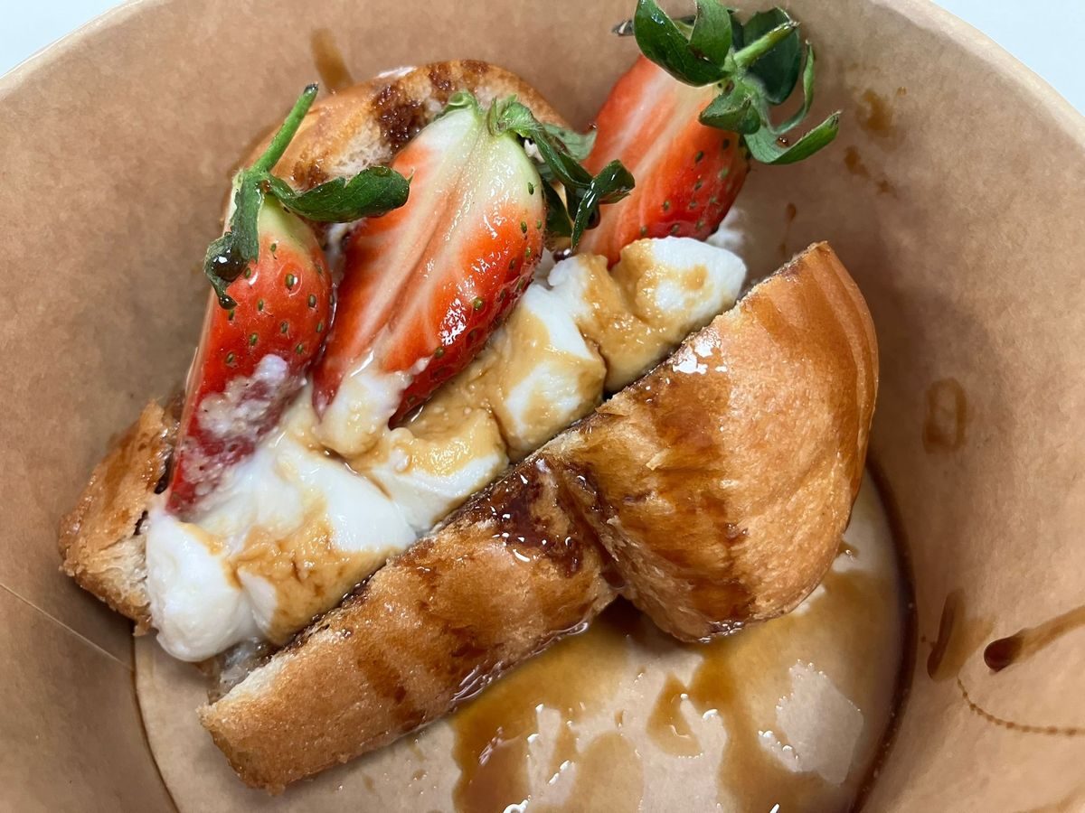 The heavenly fresh brioche drizzled with caramel syrup and impossibly flavoursome straweberries