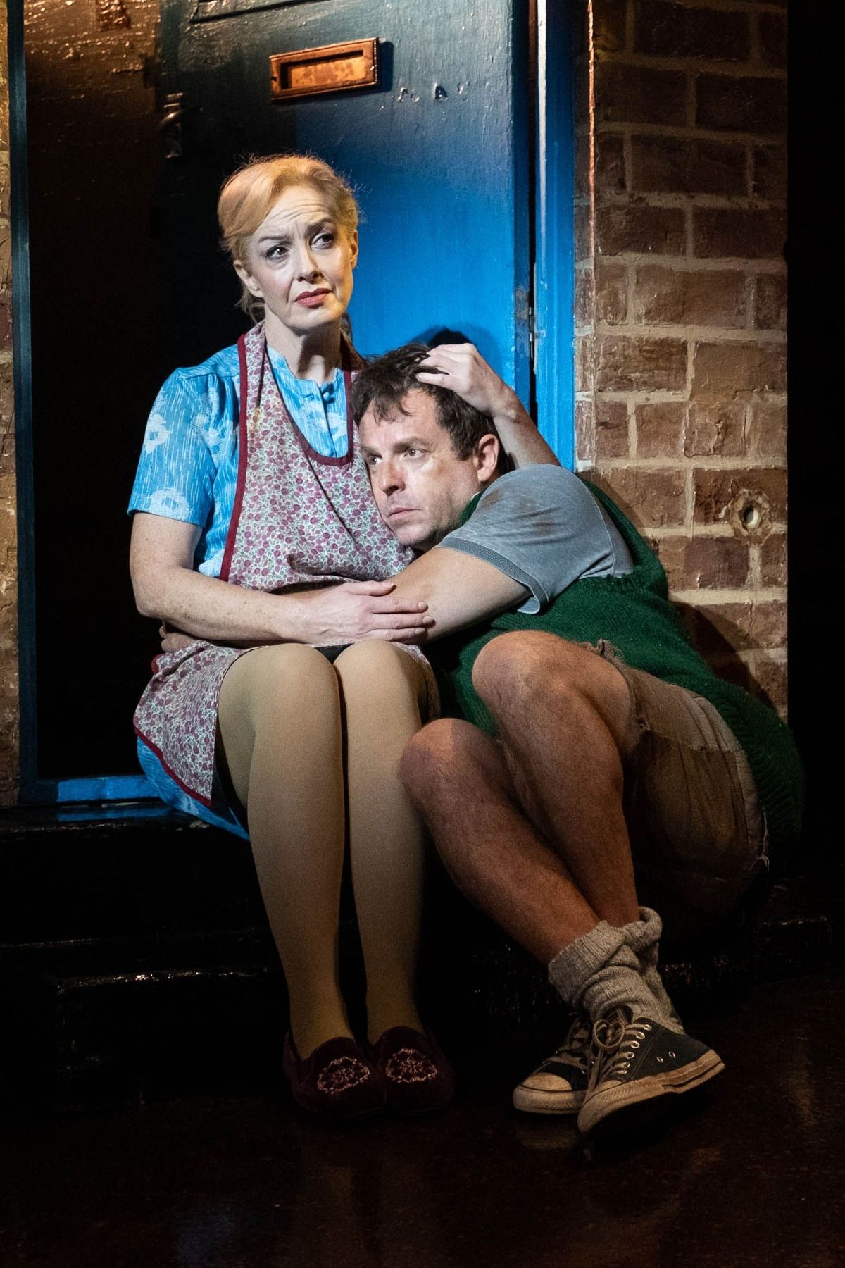 Vivienne Carlyle as Mrs Johnstone and Sean Jones as Mickey in Blood Brothers