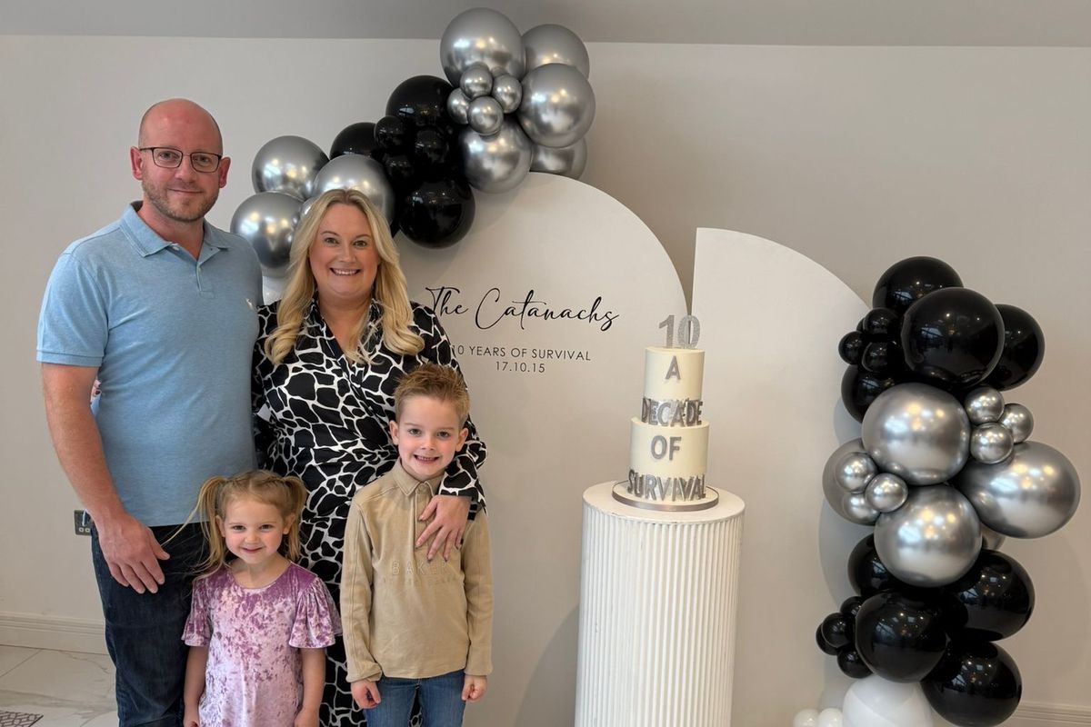 Sam Catanach with her husband Martin and children Blossom, four, and Ted, seven.