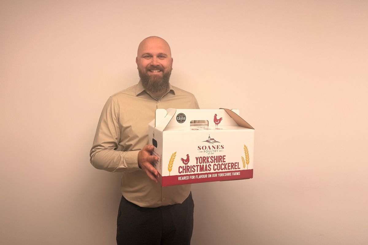 Soanes Poultry’s factory manager, Dmitrijus Solovjovas, with the Yorkshire Christmas Cockerel