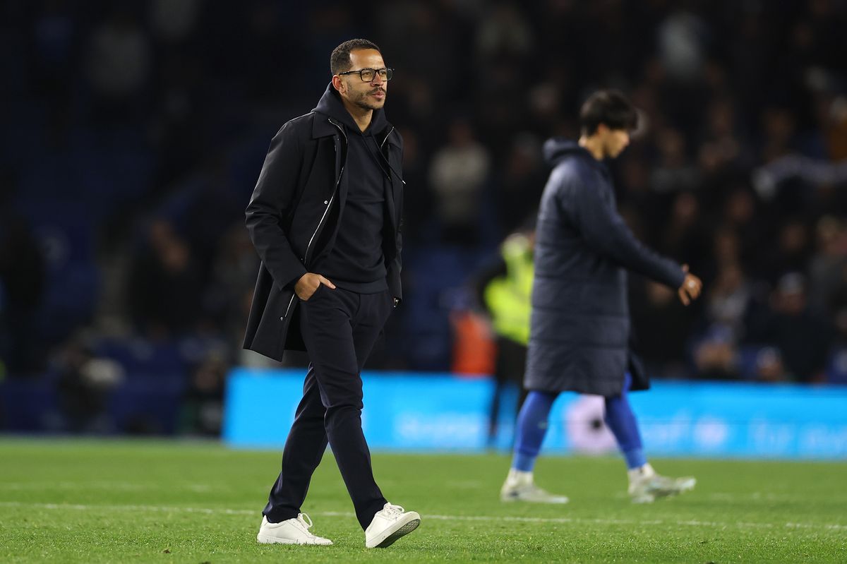 Liam Rosenior trudges off the Amex Stadium pitch ahead of his Chelsea sacking