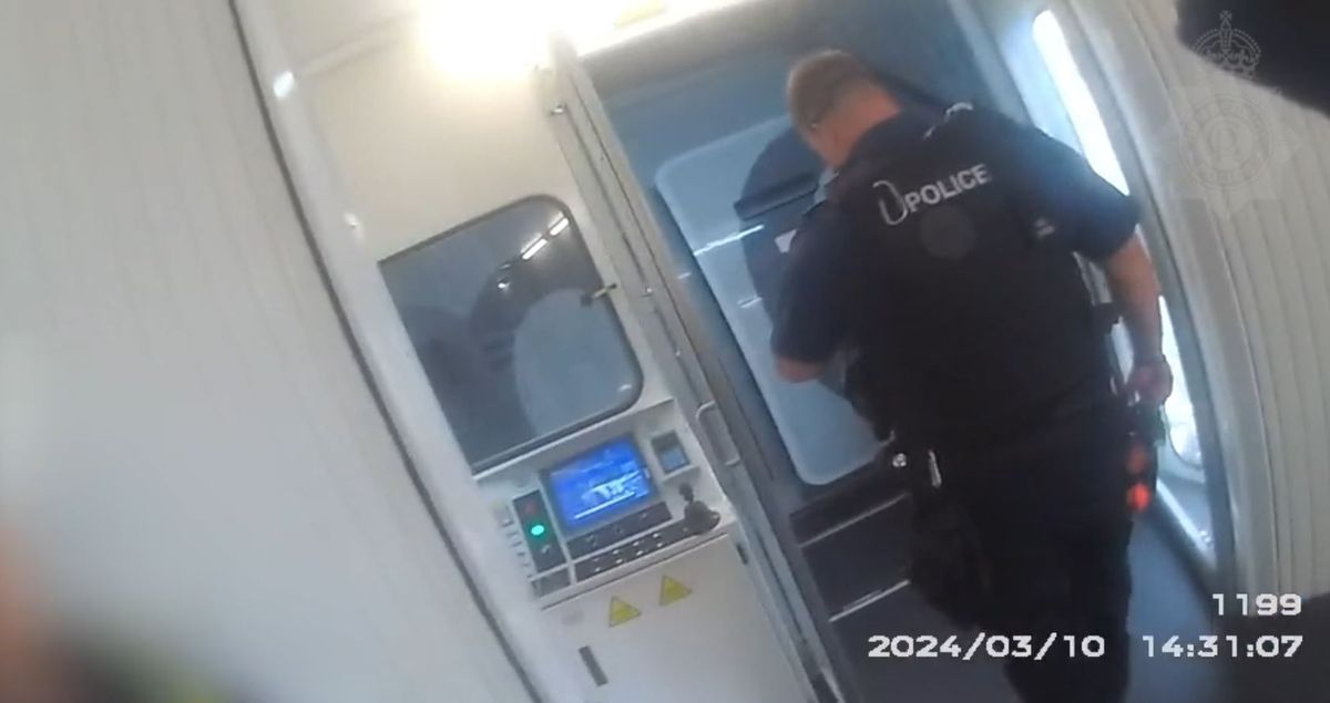Moment police board the plane to arrest Robert Bush