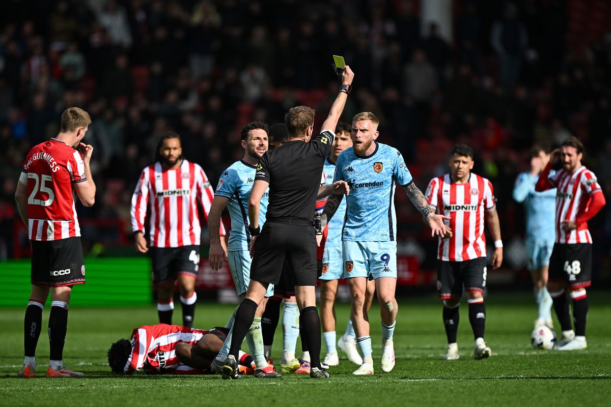 Oli McBurnie takes a booking during Hull City's clash with Sheffield United