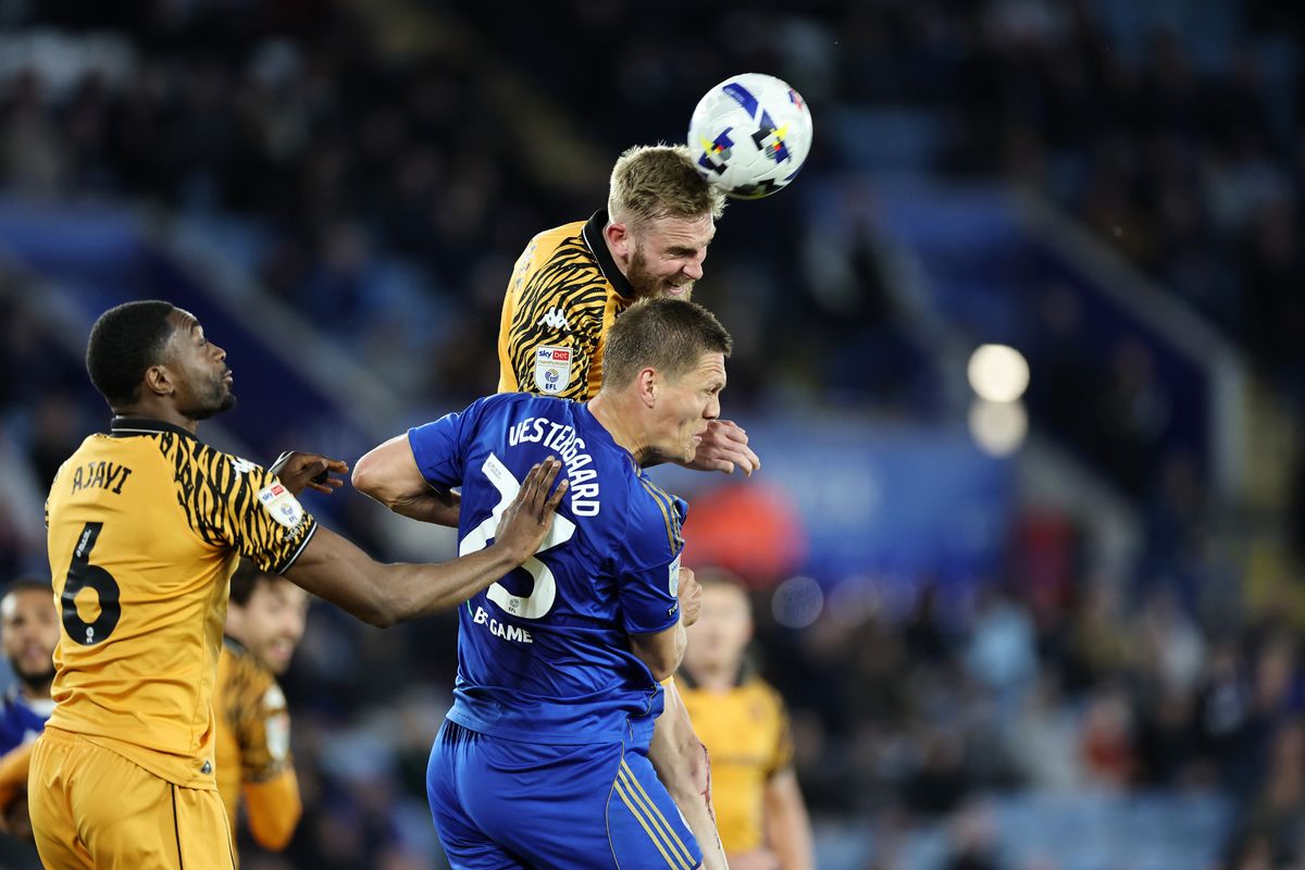 Jannik Vestergaard of Leicester City in action with Oliver McBurnie of Hull City