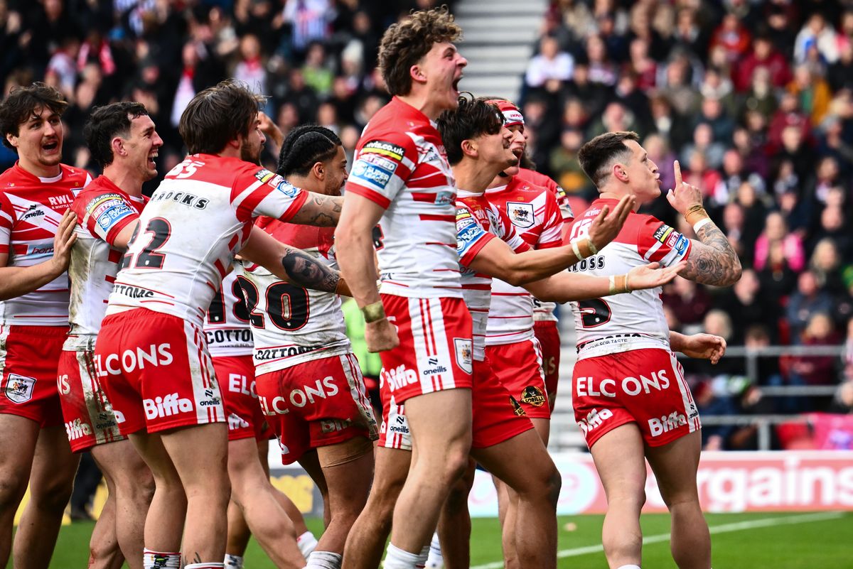 Bill Leyland celebrates his Good Friday try with St Helens against Wigan Warriors.