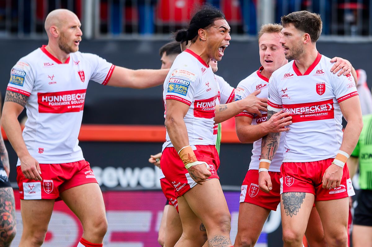 Hull KR's Oliver Gildart celebrates his try against Hull FC with Tom Amone and Jez Litten.