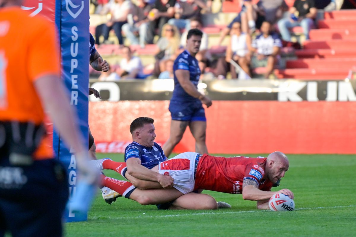 Hull KR's Dean Hadley scores just before the break against Toulouse Olympique.