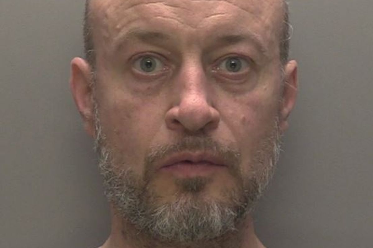 Andrew Woollen fired a crossbow at the windows of a couple's home