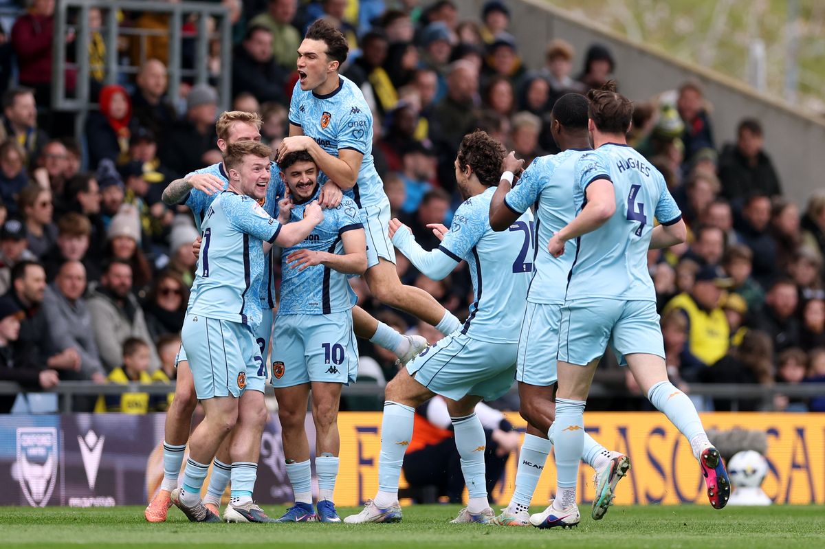 Mohamed Belloumi celebrates scoring against Oxford United