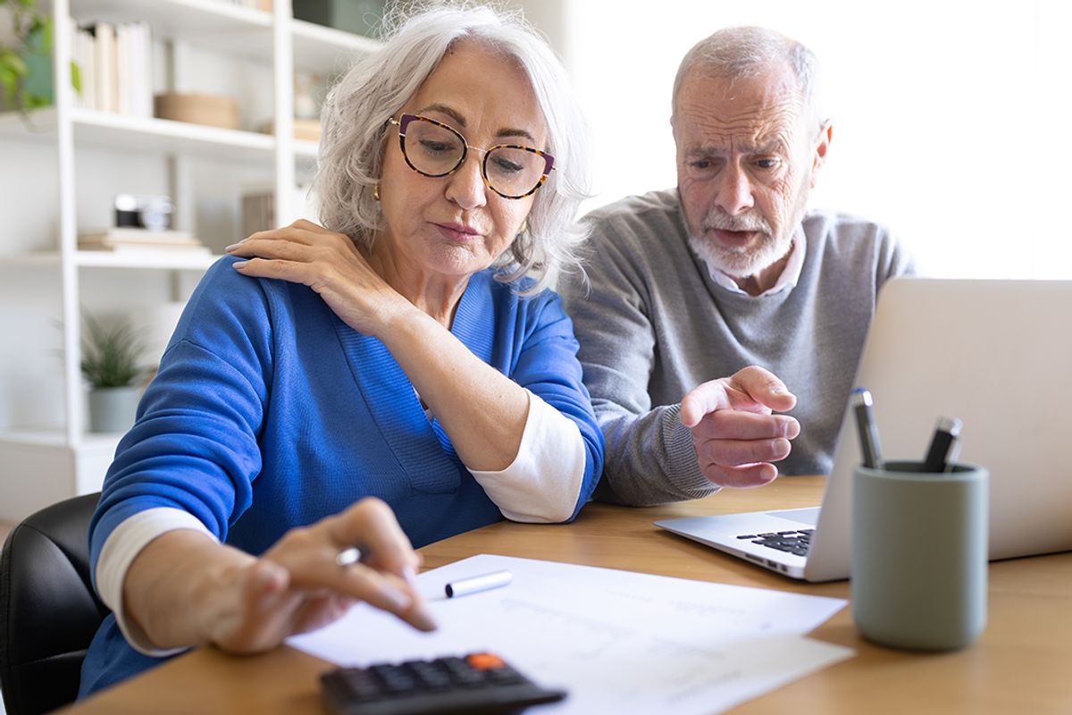 A woman checks her finances