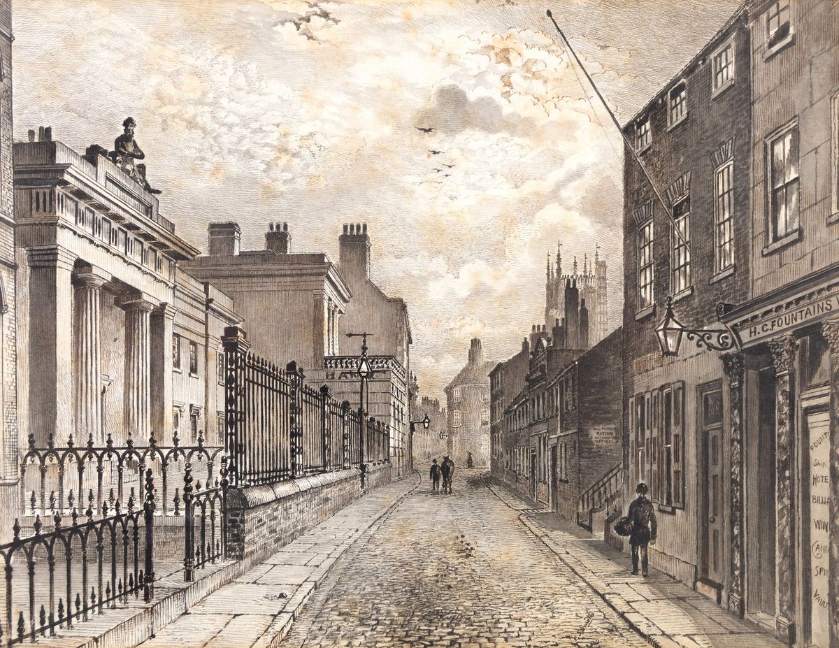 Posterngate with the amazing almshouses, topped by the colossal figure of Oceanus