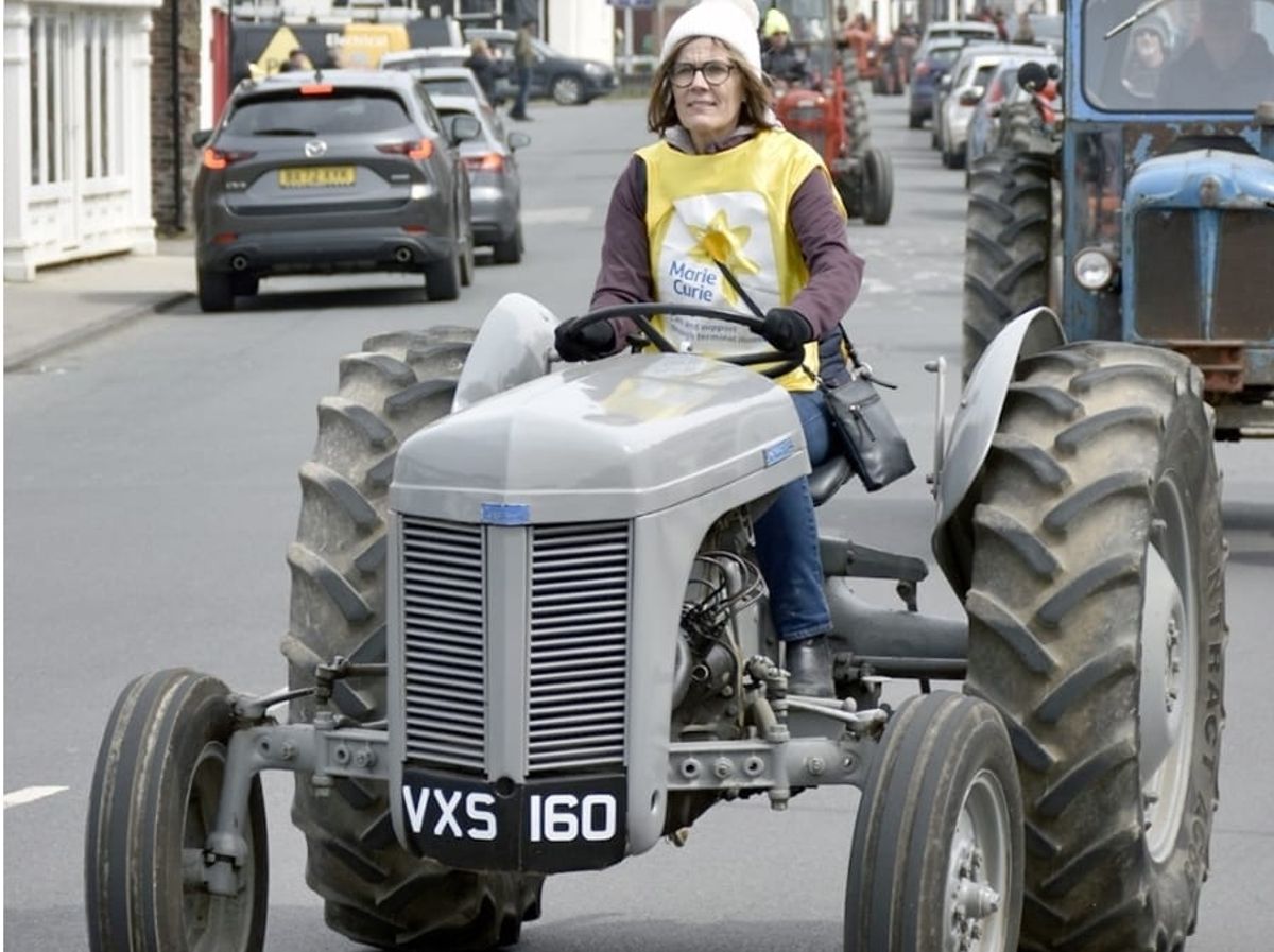 Kathryn Ward drives one of her dad's old Ferguson tractors at a previous event.