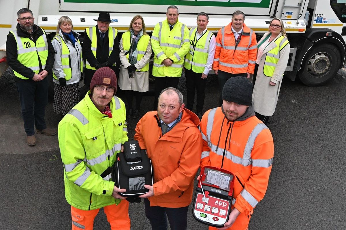04/05/26 - Councillor Paul West, East Riding Council’s cabinet member for environment and transport, was among the first to herald the adoption of portable defibrillators on every one of the authority’s bin wagons. Cllr West (front, centre) at the launch of the pioneering scheme