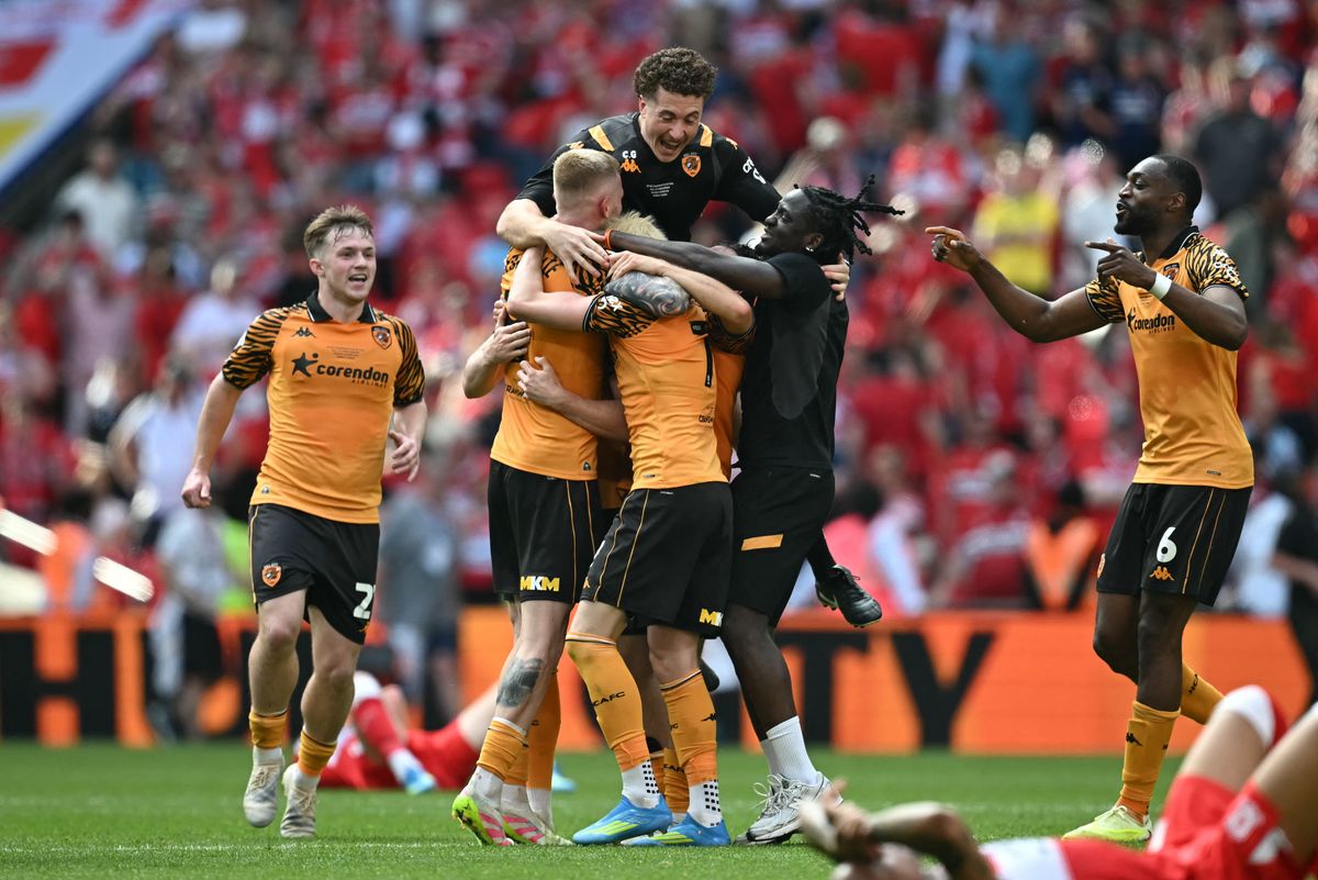 Hull players celebrate on the final whistle in the English Championship play-off final football match between Hull City and Middlesbrough at Wembley Stadium in London on May 23, 2026.