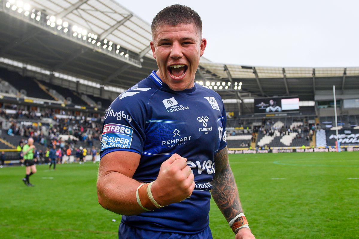 Toulouse's Joe Cator celebrates victory over Hull FC.