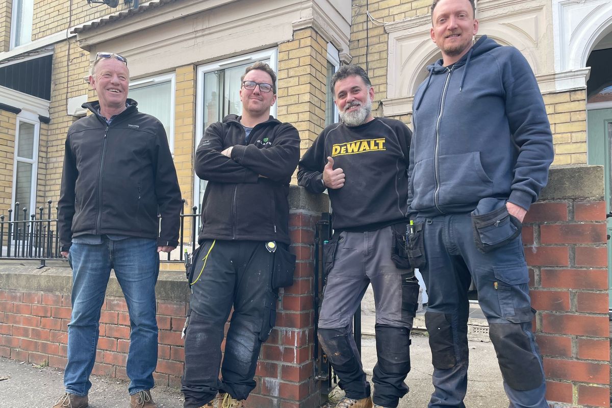 The Giroscope team in front of a house they have renovated