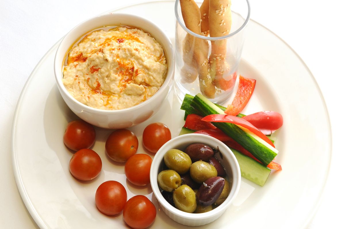 Houmous with bread sticks and olives. Cranswick has seen exceptional sales of its Mediterranean treats.