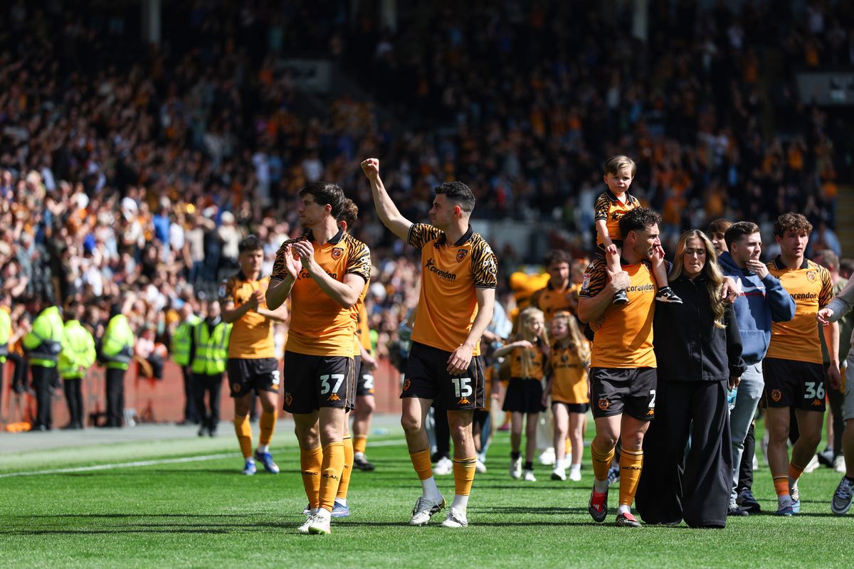 Hull City's players celebrate after the win over Norwich City