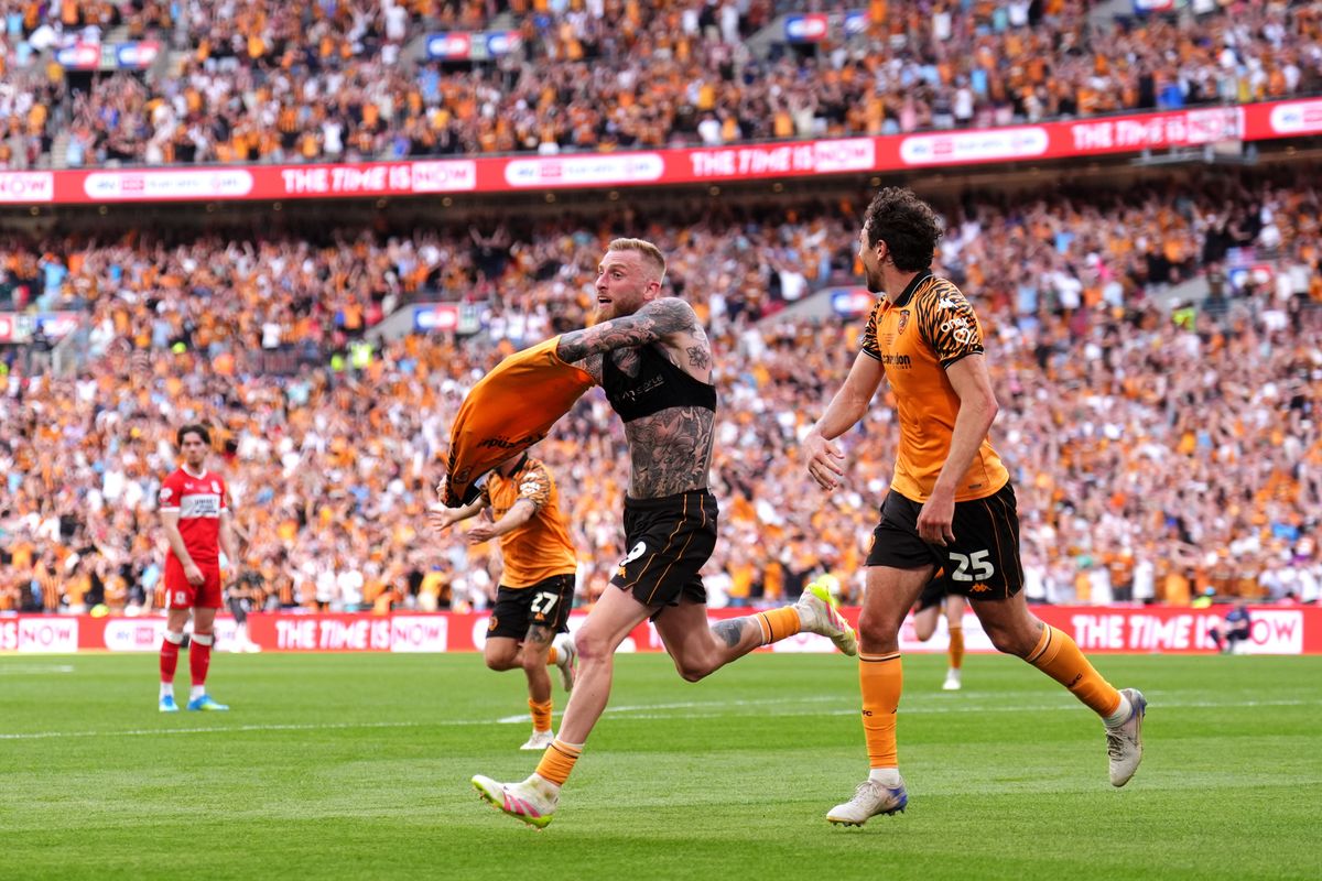 Hull City's Oli McBurnie celebrates scoring the winner at Wembley