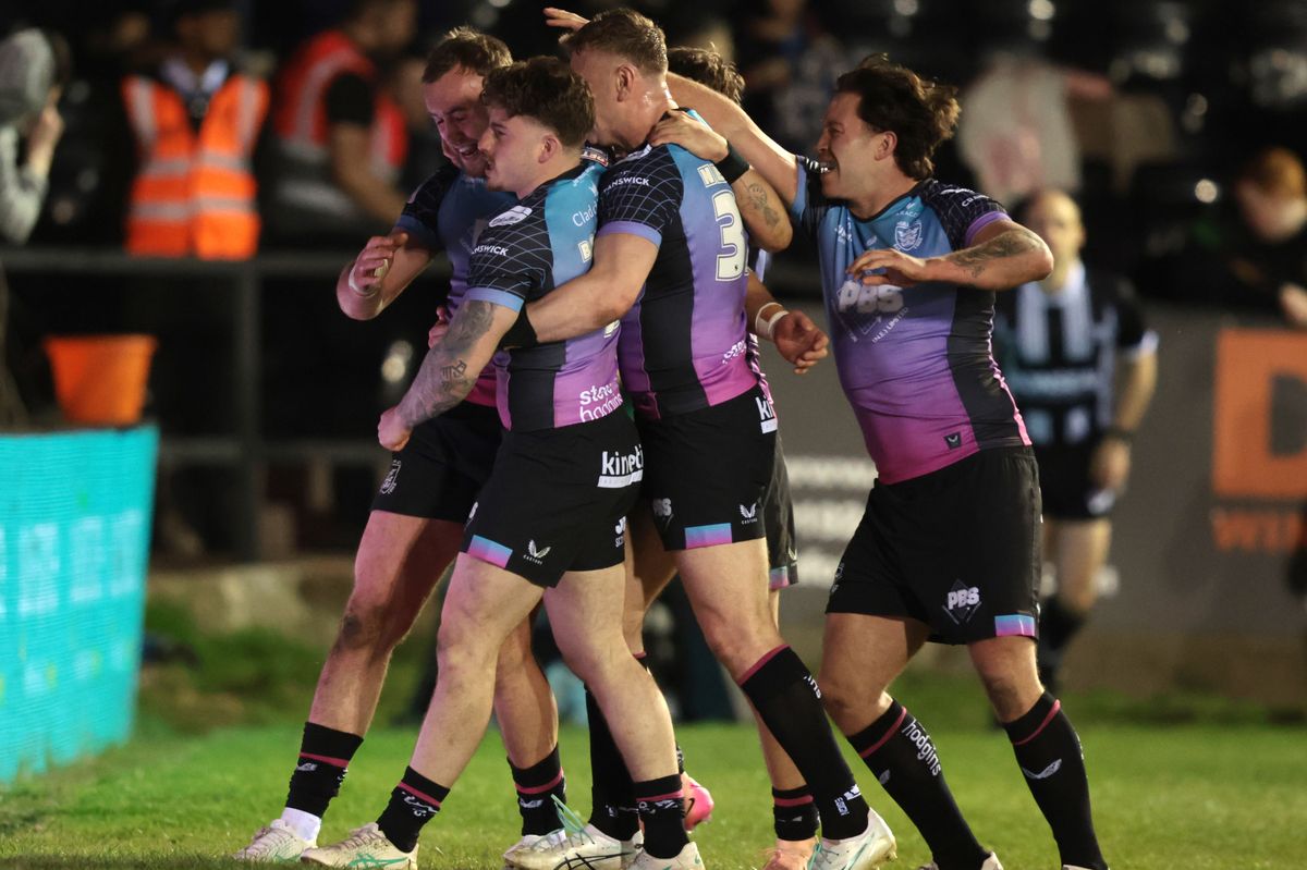 Hull FC celebrate Connor Bailey's try.