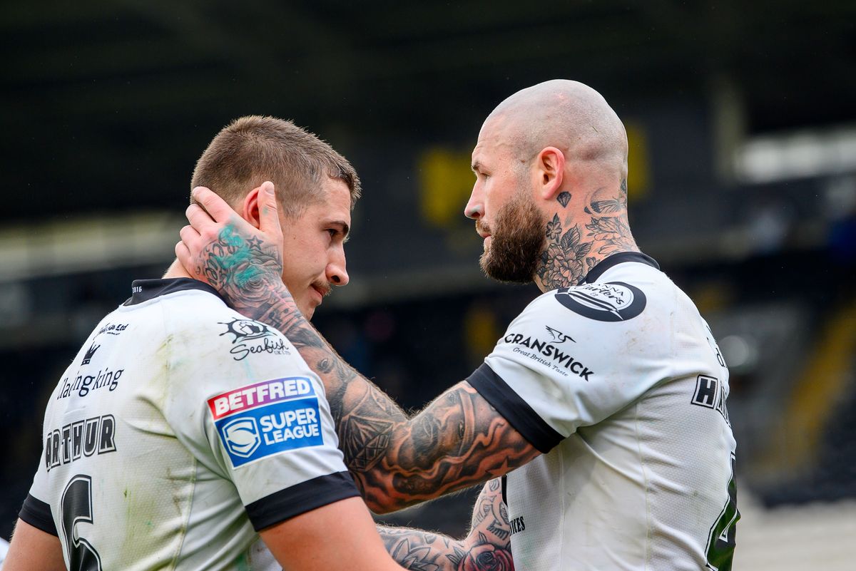 Hull FC's Zak Hardaker consoles Jake Arthur after their side's loss to Toulouse.