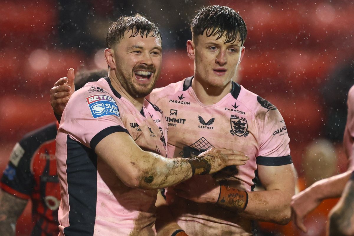 Hull FCs Joe Batchelor celebrates scoring a try.