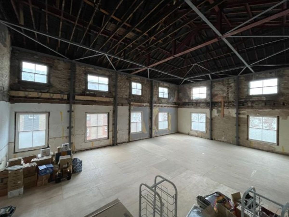 The function room of The New Clarence as it stands today — a vast, light-filled space with enormous potential