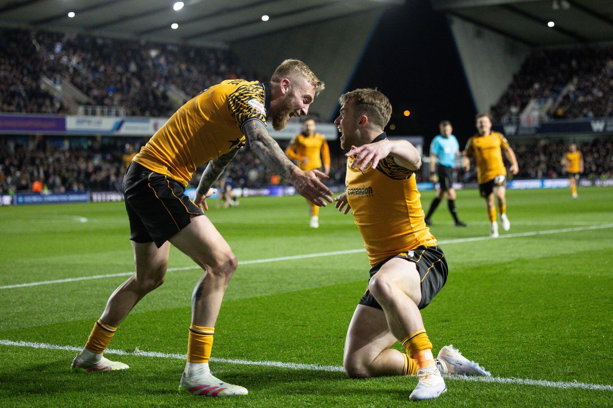 Joe Gelhardt and Oli McBurnie celebrate at The Den