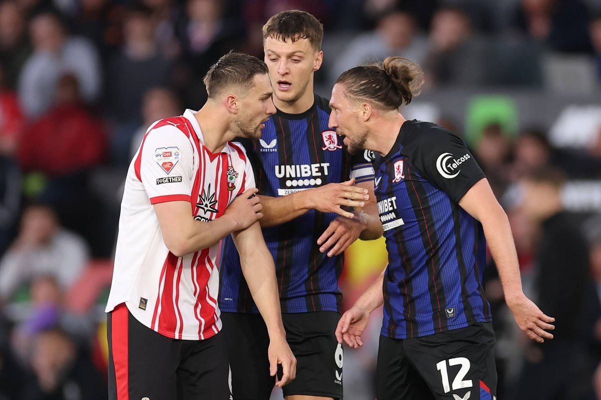 Taylor Harwood-Bellis of Southampton clashes with Luke Ayling of Middlesbrough