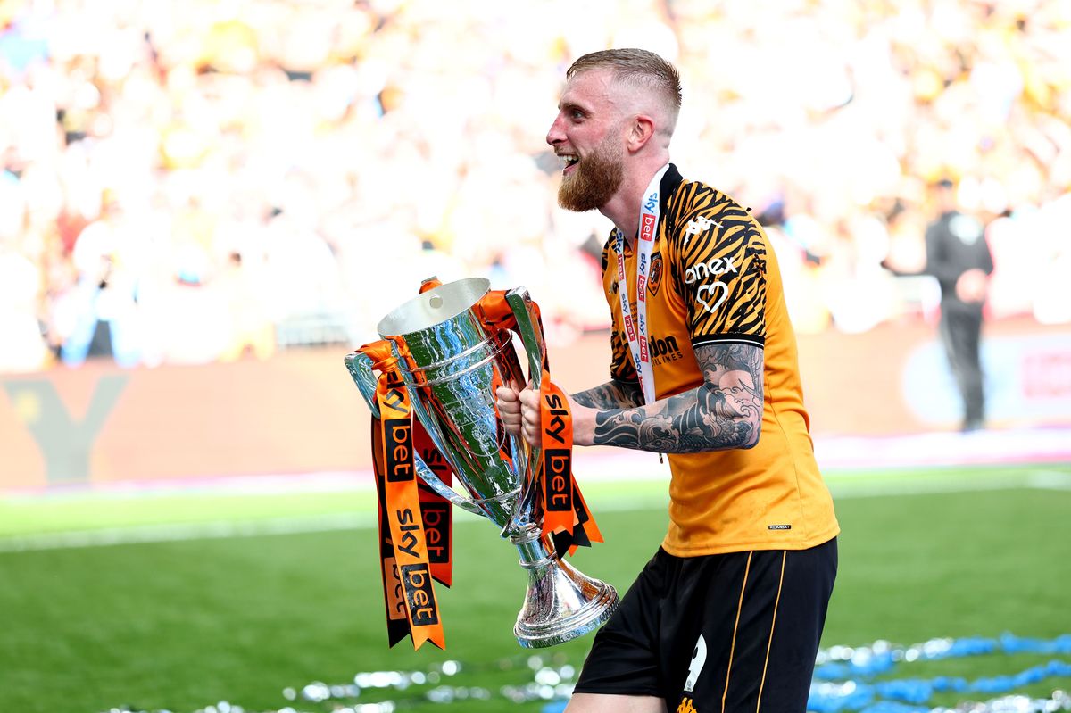 Oli McBurnie with the play-off trophy at Wembley