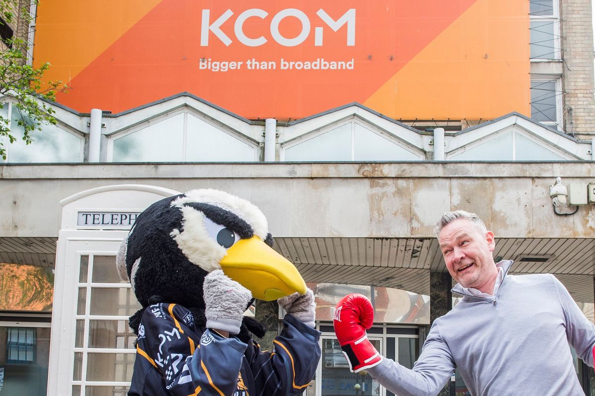 Neil Bartholomew, KCOM managing director, and Sammy the Seahawk get into a (play) fight over nesting seagulls and who is top bird in the city of Hull