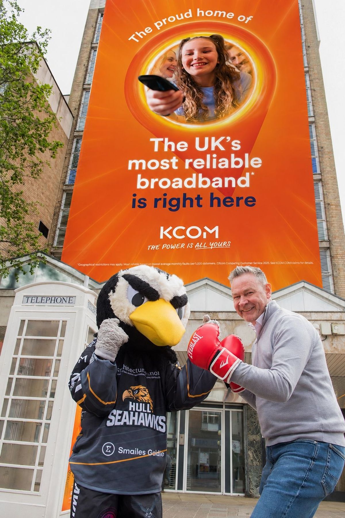 Sammy the Seahawk with Neil Bartholomew, KCOM managing director, and how the new banner should look