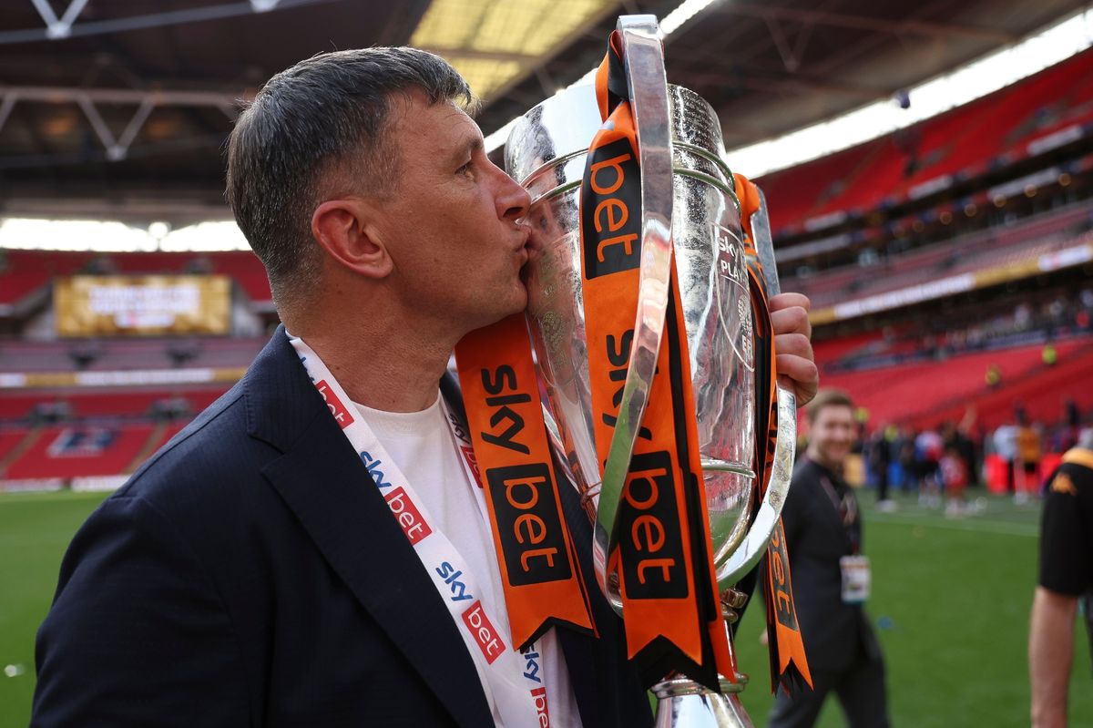 Hull City manager Sergej Jakirovic kisses the trophy