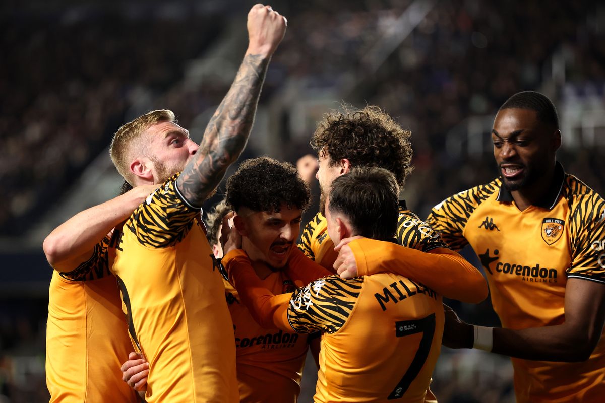 Mo Belloumi celebrates scoring in the play-off semi-final at Millwall