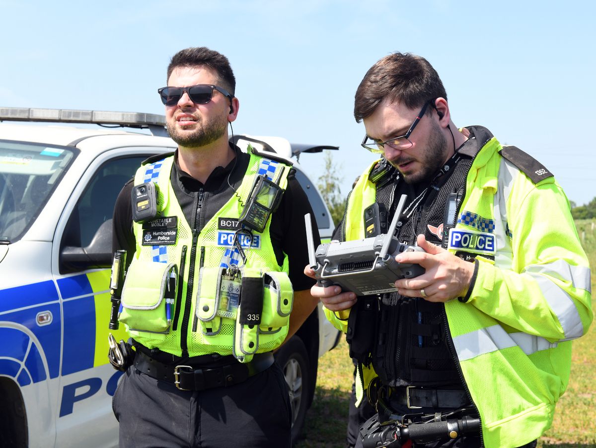 Humberside Police drone pilots PCs Dan Mosley and Darian Hullett, pictured as the drone was in operation flying towards a quarry 