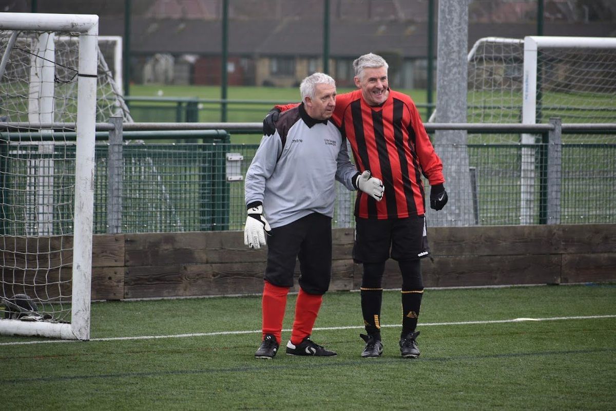 Paul Hartley, left, who is living with MND, at a walking football tournament in February 2026