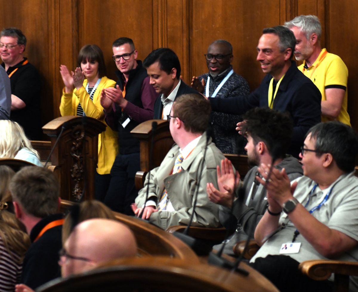 Cllr Mike Ross (seen in the yellow lanyard) will remain as the council leader